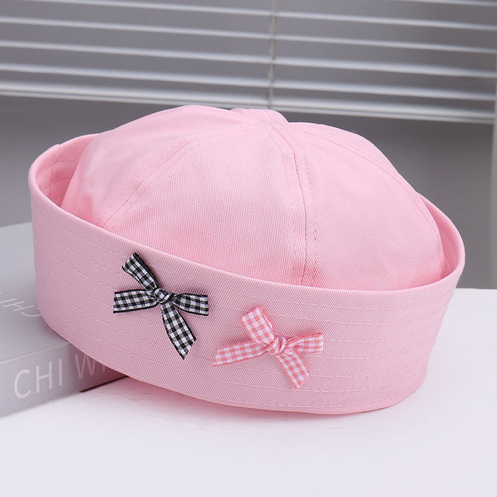 Wholesale Striped bow sailor hat is lightweight, breathable, niche, and comfortable with flip over eaves