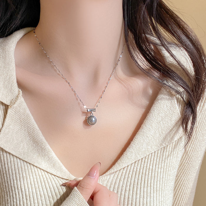 Wholesale Titanium steel double-sided pearl pendant necklace with light luxury and niche design
