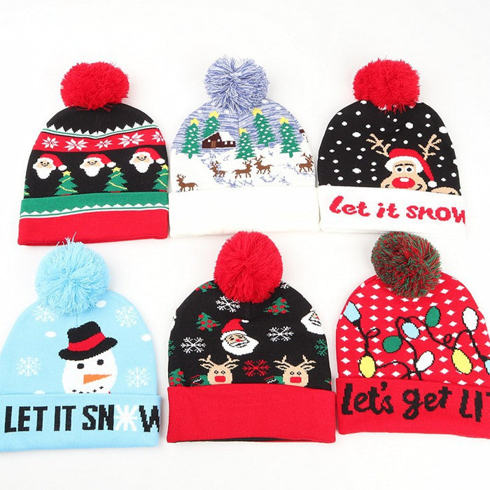 Wholesale Warm jacquard wool hat with cuffs and balls Christmas hat with elk earmuffs