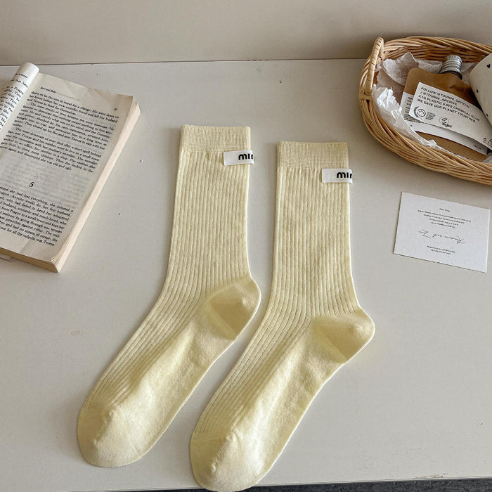 Wholesale Medium length socks with solid color letters, fabric labels, stacked socks, thin cotton socks, sweat absorbing and breathable