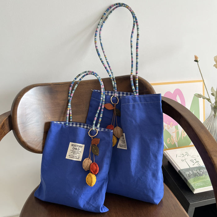Wholesale Double-sided denim canvas bag, versatile retro contrasting handbag for commuting