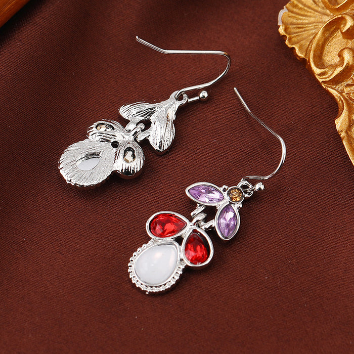 Wholesale Inlaid with colorful leaves,  crystal diamonds and moonstone earrings,  European and American creative water drop pear-shaped earrings for women