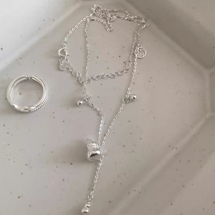 Wholesale Minimally designed silver tassel heart-shaped necklace with light luxury and niche design pendant