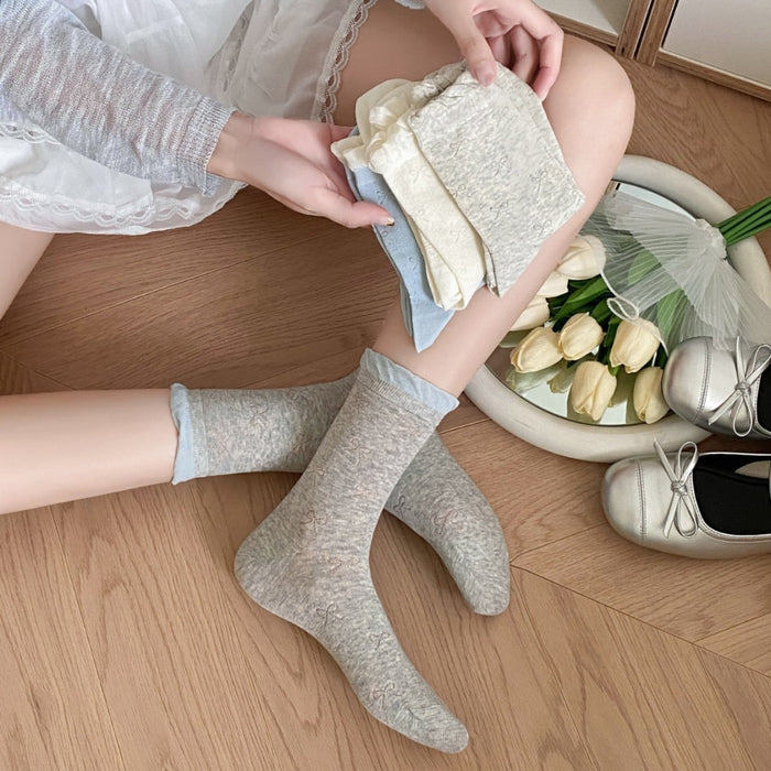 Wholesale Color blocked bow socks, boneless lace pile socks, mesh eyelets, tube socks