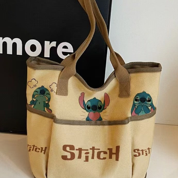 Wholesale Cartoon canvas bag for women's casual and versatile, hand-held for outdoor use, large capacity practical shoulder bag