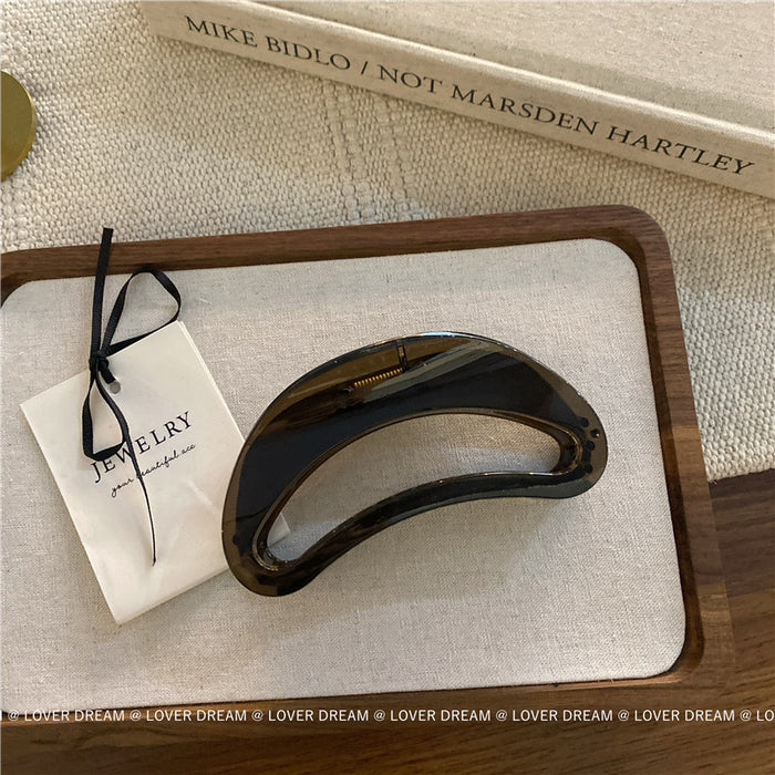 Wholesale Pink semi-circular hair clip with shark clip at the back of the head, versatile hair accessory