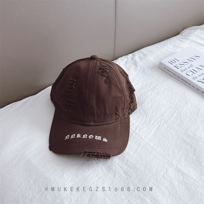 Wholesale Children's duckbill cap with worn holes, embroidered letters, fashionable sun shading baseball caps for boys and girls