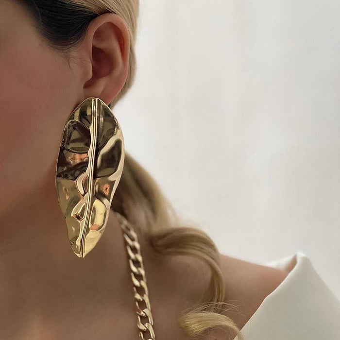 Wholesale Exaggerated alloy leaf earrings, niche folds, irregular earrings, earrings, studs