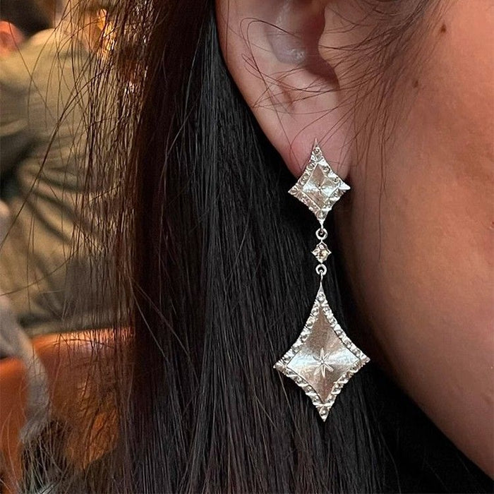 Wholesale Cool Sense Silver brushed Diamond Earrings Simple High-end Sense Italian Carved Gold Long Earrings Women' s Earrings