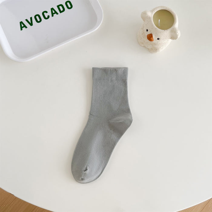 Wholesale Middle school women's solid color simple pile socks made of pure cotton