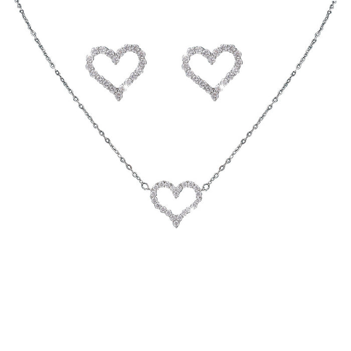 Wholesale Alloy Micro-inlaid Diamond Hollow Heart Bracelet Necklace Earrings Three-piece Set JDC-NE-ZhuoM016