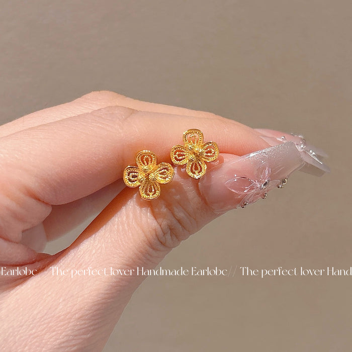 Wholesale Sand gold hollowed out exquisite flower earrings, niche temperament earrings, high-end and versatile earrings