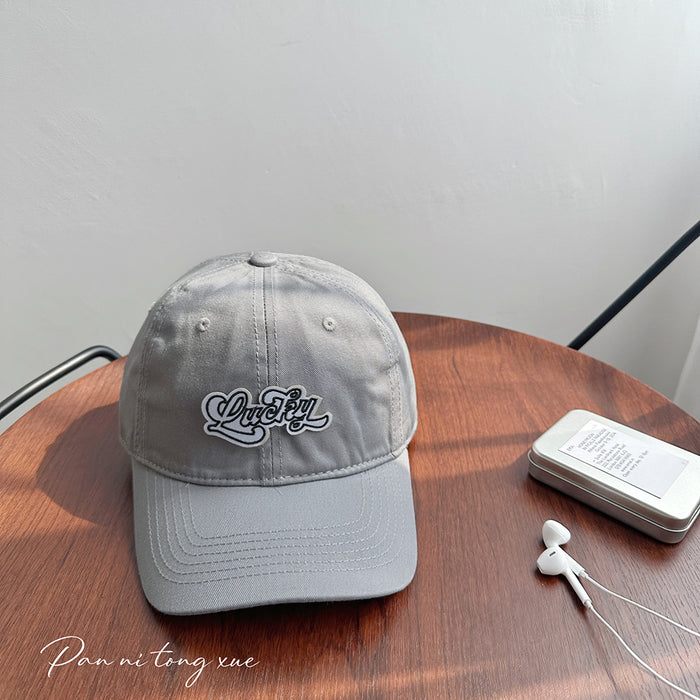 Wholesale Vintage washed embroidered letter baseball cap with wide brim, soft top, duckbill cap, versatile hat