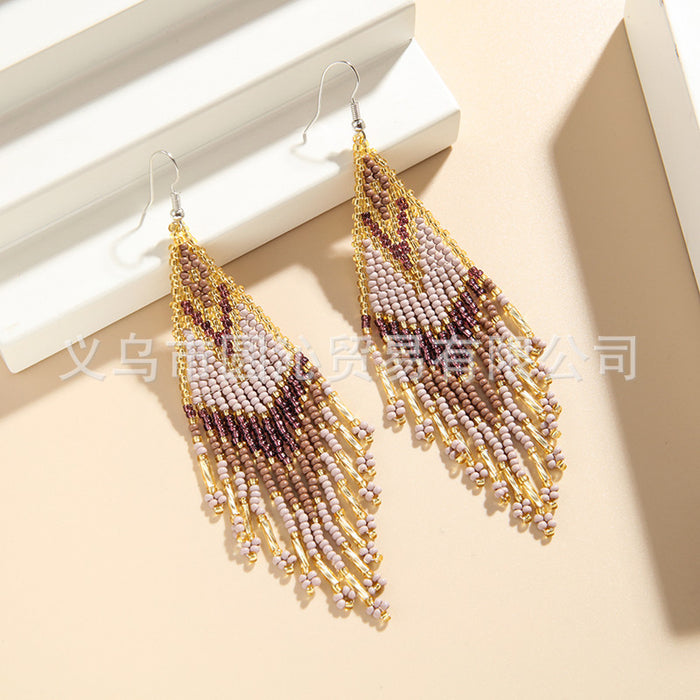 Wholesale color Bohemian rice bead earrings women' s minority ethnic hand-woven long tassel earrings