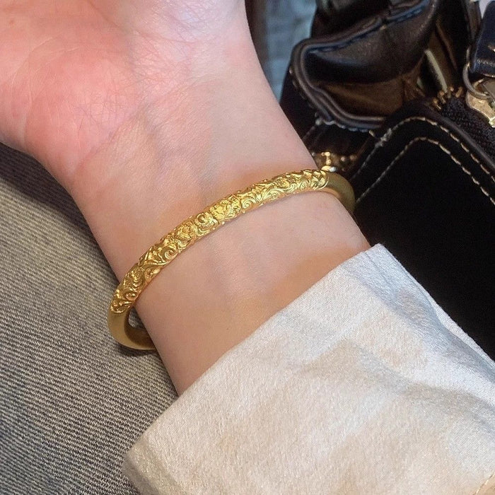 Wholesale Solid Bracelet with Purple Bauhinia Pattern and Curling Pattern