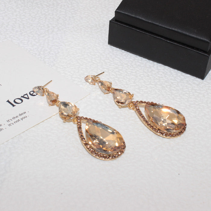 Wholesale Exquisite and luxurious water droplet studded diamond earrings, fashionable and high-end long alloy ear accessories