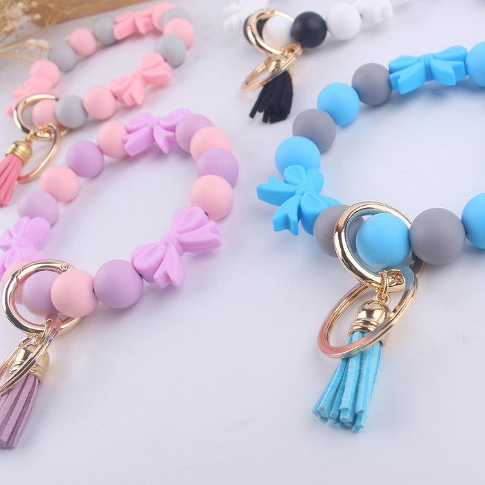 Wholesale Cartoon bow silicone bracelet keychain handmade beaded bracelet jewelry