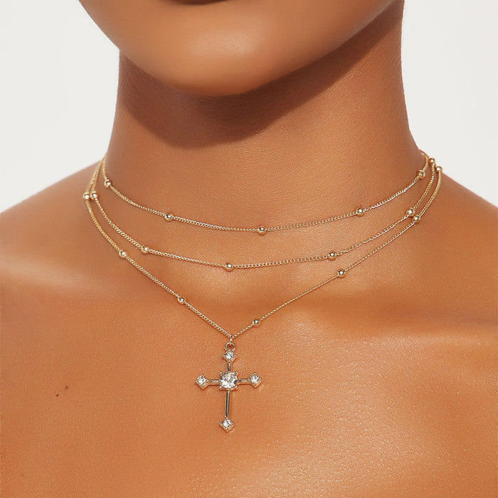 Wholesale Fashionable, minimalist, niche temperament cross necklace with multiple layers of diamonds and gold beads