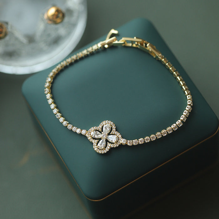 Wholesale Real Gold Electroplated Zircon Four-petal Flower Imitation Fritillaria Bracelet Light Luxury High-end Sense Bracelet Sweet All-match Bracelet Wholesale Women