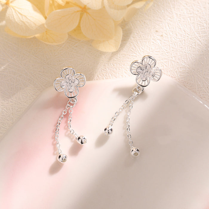 Wholesale Hollow flower tassel earrings, fashionable lucky clover earrings