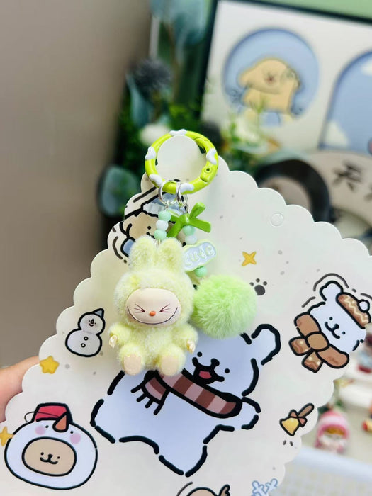 Wholesale Cute mini flocked sitting posture toy