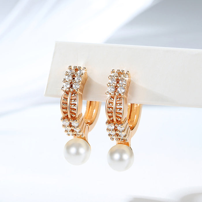 Wholesale Copper gold-plated retro light luxury simple pearl earrings, small and fashionable design, inlaid with zircon ear buckles, wholesale of ear accessories