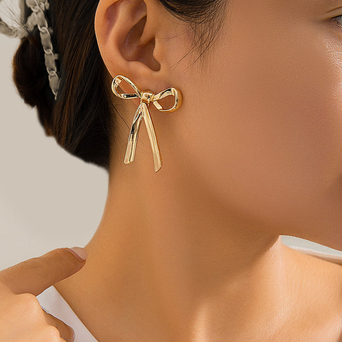 Wholesale Butterfly knot earrings, niche metal ribbon knotted simple earrings