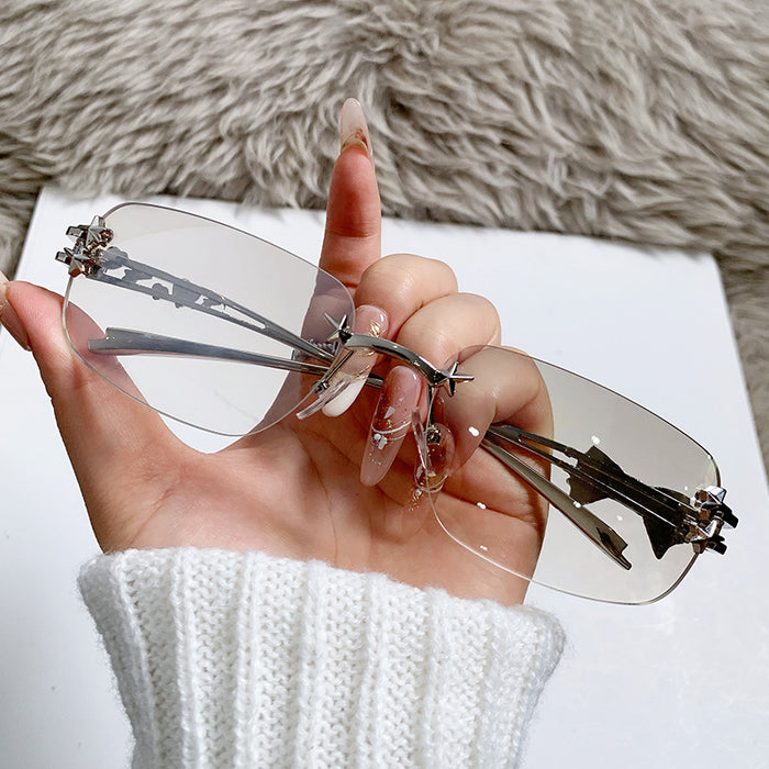 Wholesale Frameless square bow sunglasses for women with a high-end feel, star studded spicy girl sunglasses