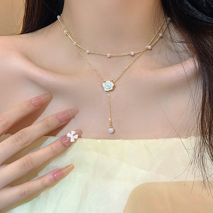 Wholesale Double layered tassel pearl necklace, niche design pendant, collarbone chain, high-end temperament, neck chain