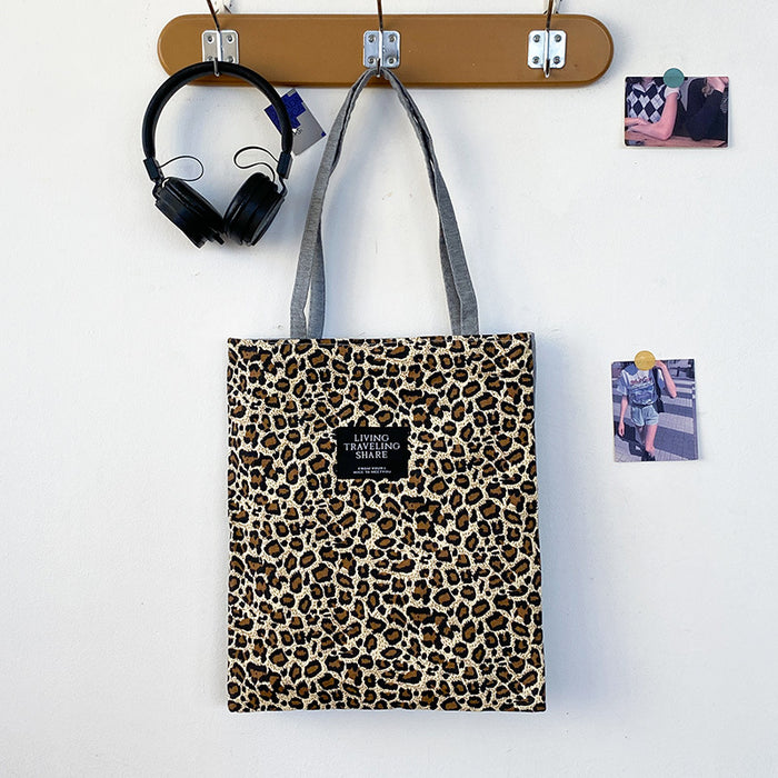 Wholesale Small niche, high-capacity commuting, fashionable design, leopard print handheld