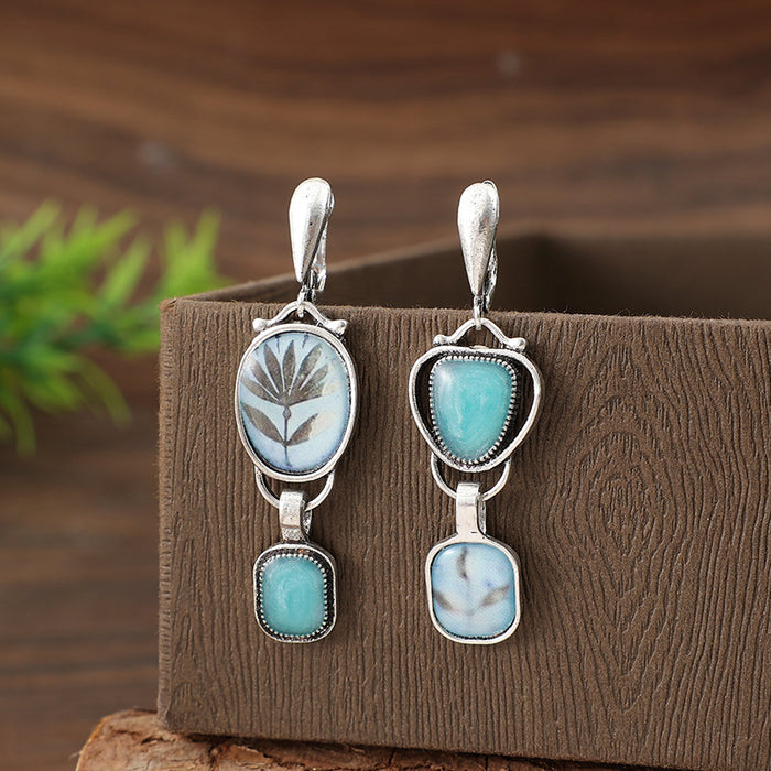 Wholesale Retro ethnic style asymmetrical geometric inlaid blue gemstone printed plant alloy earrings