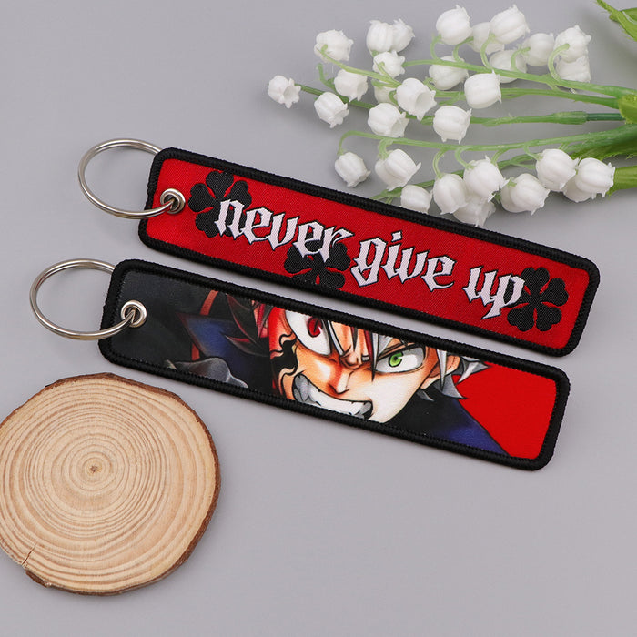 Wholesale Fabric Woven Label Black Clover Cartoon Keychain Bag Charm For Student Campus Gift MOQ≥3
