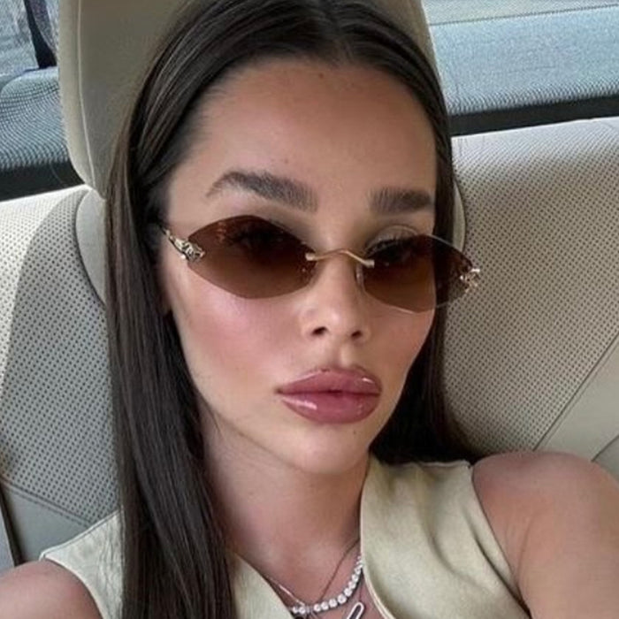 Wholesale Diamond shaped frameless cut sunglasses, leopard sunglasses, men's retro personalized sunscreen glasses