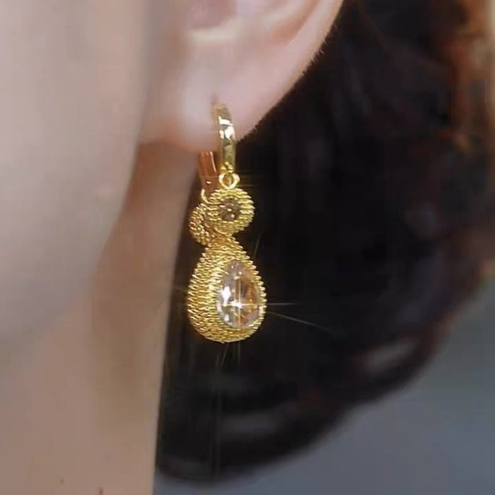 Wholesale Light luxury high-end coffee colored zircon earrings for women, with a niche design and versatile temperament. Earrings with fashionable water droplet earrings and buckles
