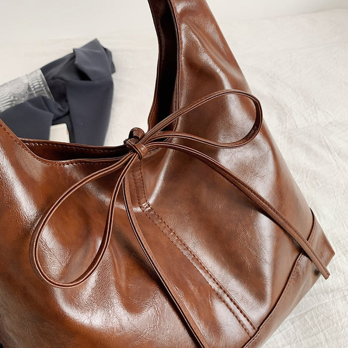 Wholesale Small commuting bag, versatile leisure bag, bow tie, large capacity single shoulder underarm tote bag