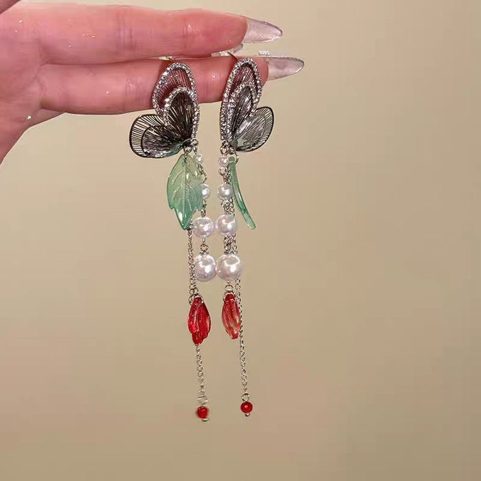 Wholesale Sparkling diamond dynamic hollow butterfly tassel earrings, light luxury temperament, high-end feeling, niche earrings, exaggerated earrings