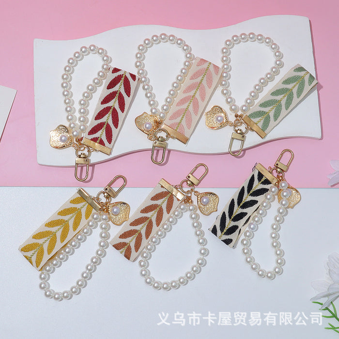 Wholesale Ribbon car alloy keychain pendant creative leaf striped pearl accessory bag decoration