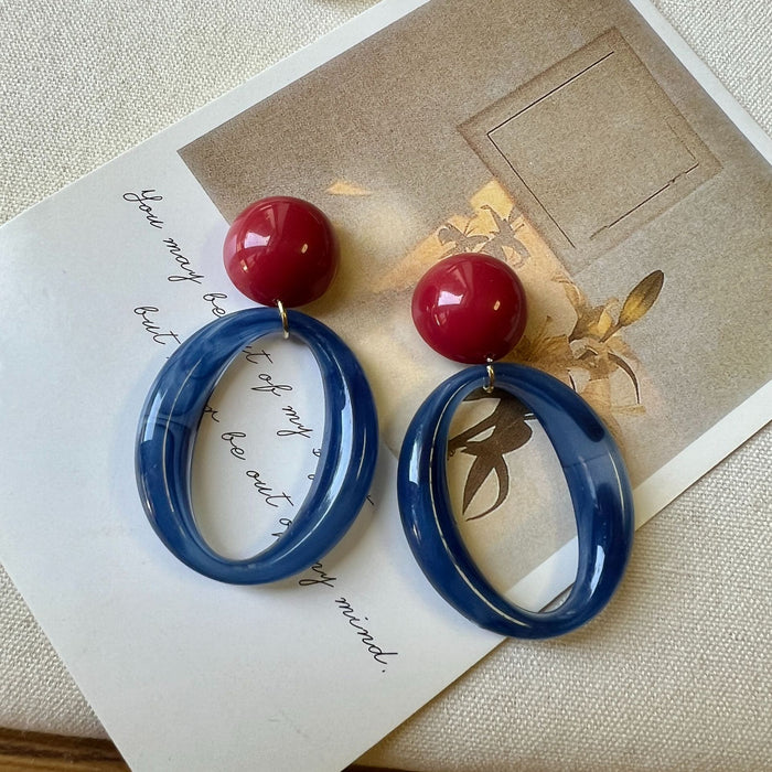 Wholesale Red and blue contrasting geometric ring earrings exude a literary and artistic atmosphere, with personalized and niche earrings for women