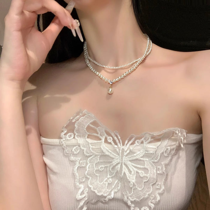 Wholesale Retro pearl double layered necklace with high-end feel, light luxury, niche collarbone chain