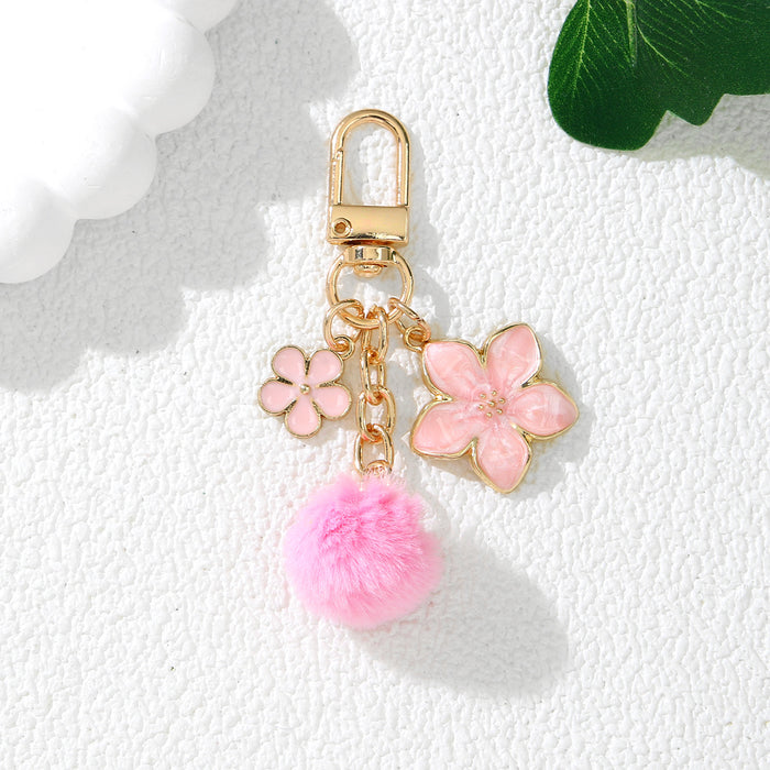 Wholesale Cute Cherry Blossom Flower Alloy Keychain Pendant Purple Decorative Accent for Resale