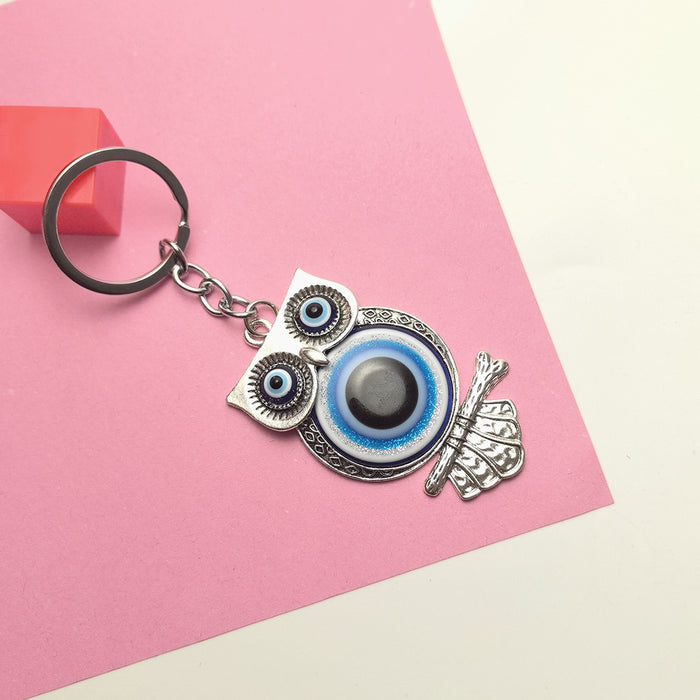 Wholesale Blue Eye Pendant Flower Butterfly Keychain Pendant Bag