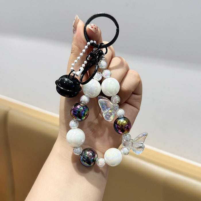 Wholesale Creative keychain, colorful bead phone chain, headphone bag, small pendant