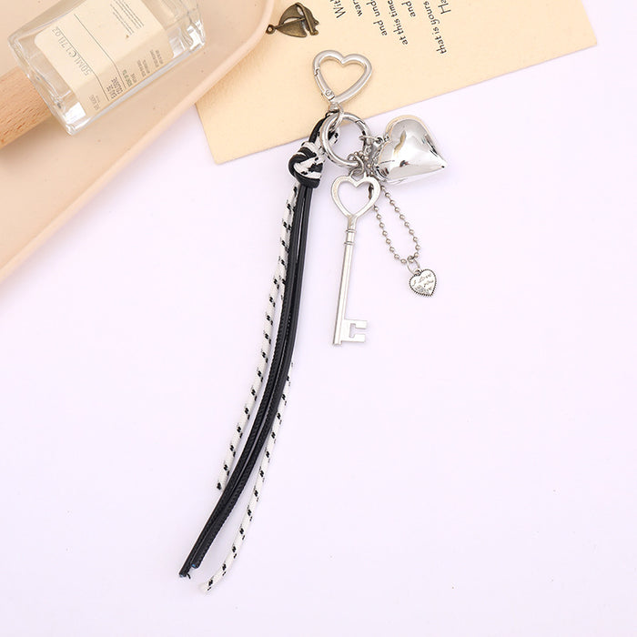 Wholesale Leather bow heart pendant luggage keychain lanyard accessories single buckle tassel pendant accessories