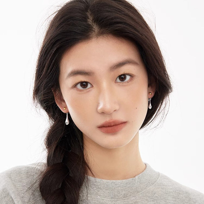 Wholesale Retro contrasting water droplet earrings with niche design, high-end sense, simple personality, fashionable temperament, silver plated earrings