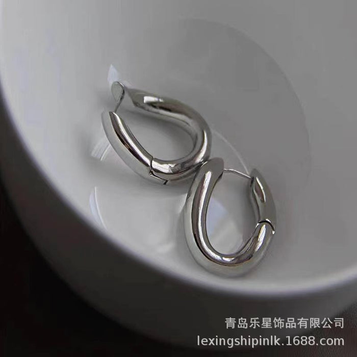Wholesale Simplicity, individuality, versatility, fashion, oval ring, curved ear buckle, women's niche design, elegant and versatile