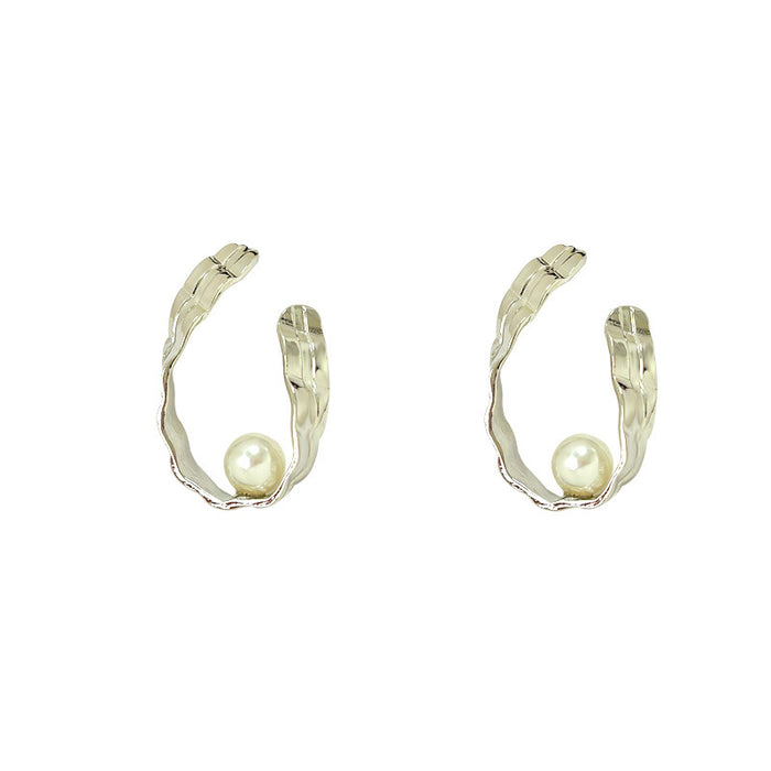 Wholesale Fashionable and luxurious silver pearl earrings with simple and niche design, personalized and irregular earrings