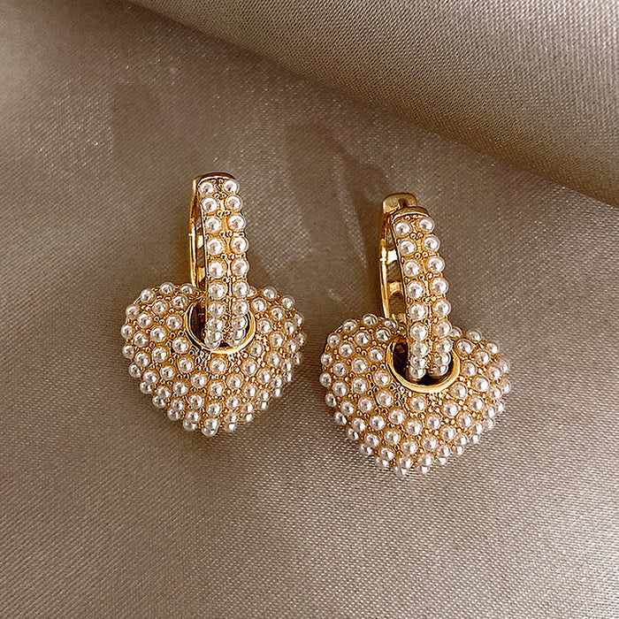Wholesale Fashionable and exquisite pearl heart ear buckle with a high-end feel, a two wearing temperament geometric earring