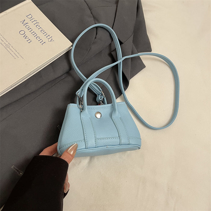 Wholesale Children's bag with high-end lychee pattern mini garden bag, girls' parent-child fashion show crossbody bag