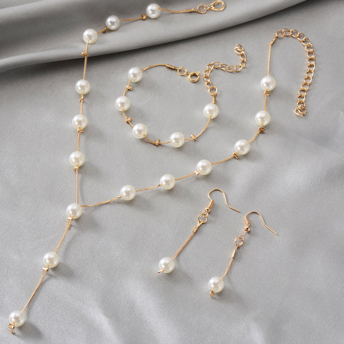Wholesale Jewelry Fashion Pearl Pendant Alloy Luxury Pearl Earrings Bracelet Earrings Necklace Set