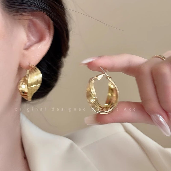 Wholesale Earrings, silver needles, niche design, high-end twisted ear loops